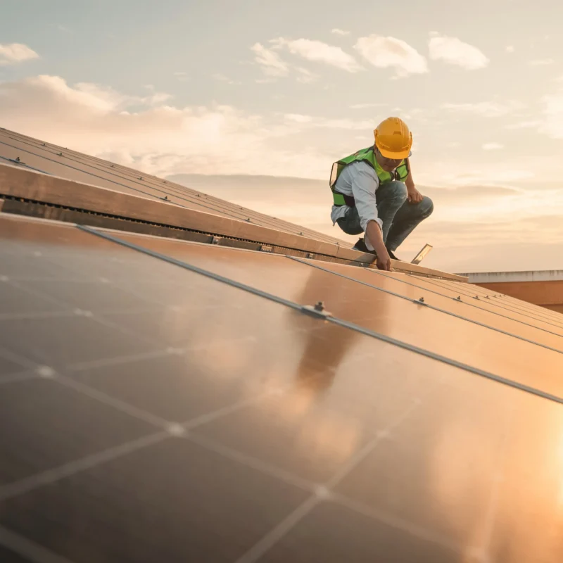 Roof with solar panels in Malta during sunset, showcasing the benefits of solar energy for homes.
